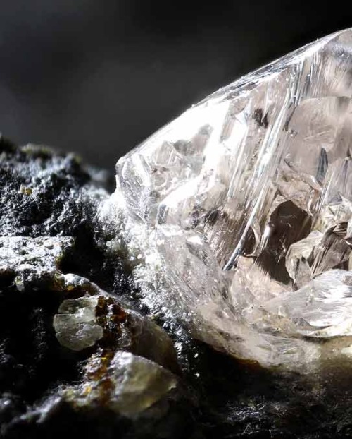 Rough natural diamond set in some magma