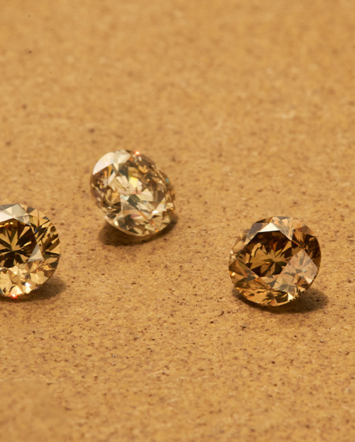 Ombre of desert diamond gemstones in sand